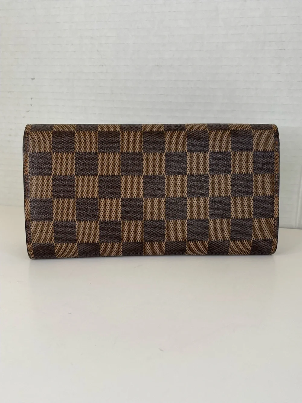 Louis Vuitton Sarah Wallet in Damier Ebene canvas